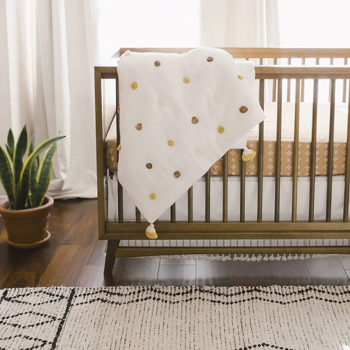 Pom Pom Quilted Baby Blanket